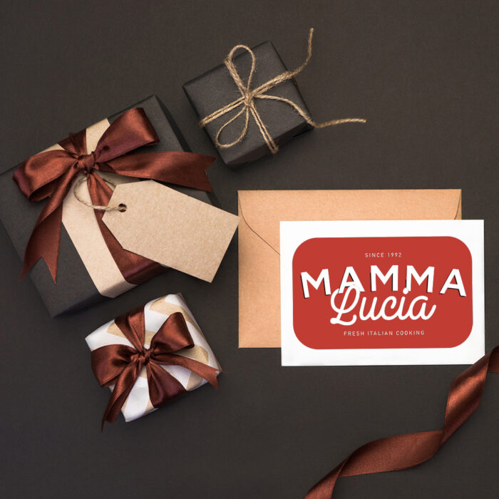 Mamma Lucia gift card next to three small presents
